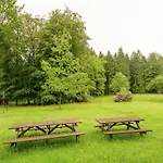 Semesterbostad Rustic Retreat In Houvegne